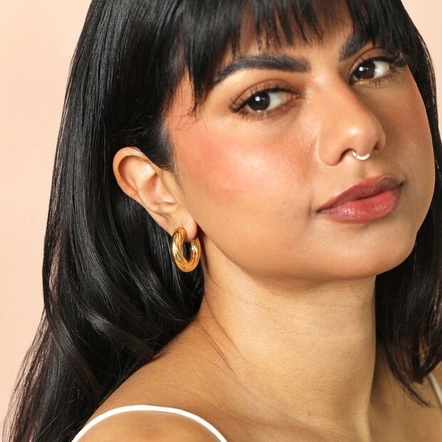 Chunky twisted hoop gold earrings