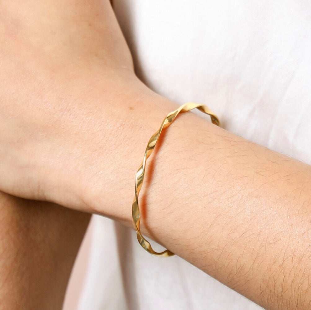 Gold twisted bangle