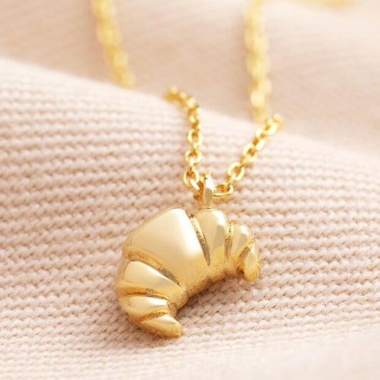 Croissant pendant necklace in gold