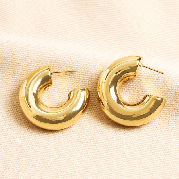 Chunky large hoop gold earrings