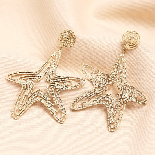 Oversized hammered starfish outline drop gold earrings