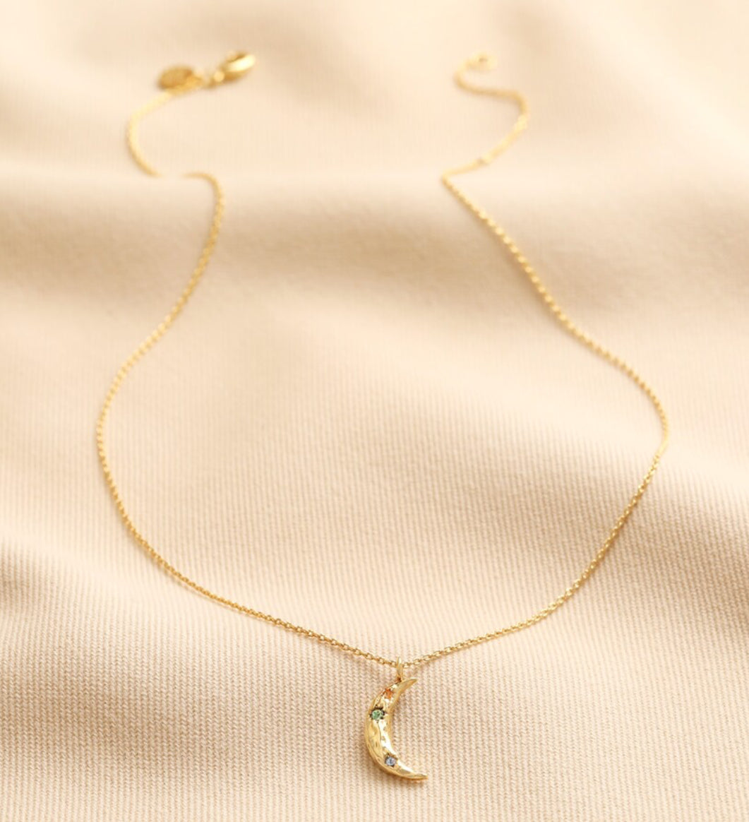 Crystal crescent moon necklace in gold with colour crystals