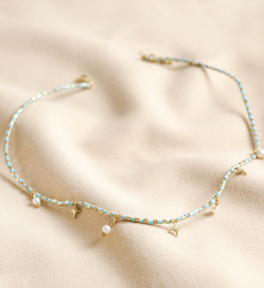 Blue bead star and pearl charm necklace in gold